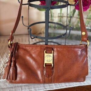 The Sak Leather Pouchette Shoulder Bag. Caramel Color. Gold toned hardware.